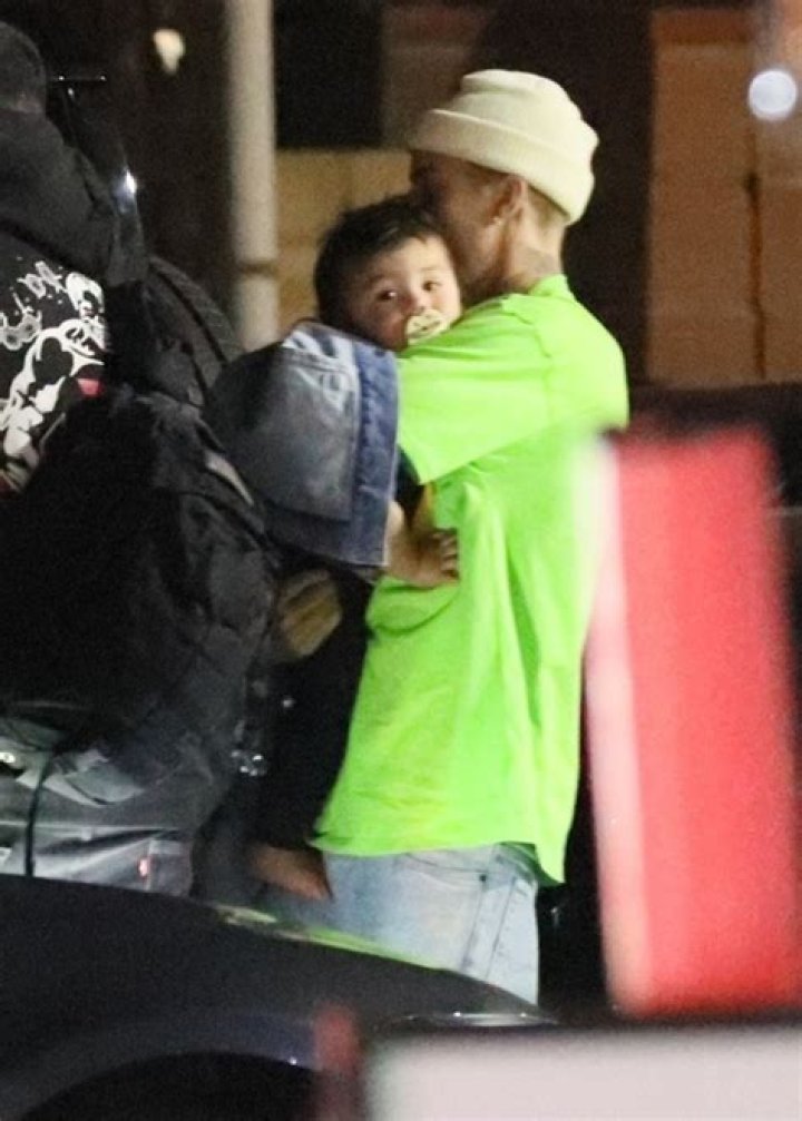 Justin Bieber Kisses A Friend’s Baby At Late Night Dinner After Hailey Teases Their Family Plans